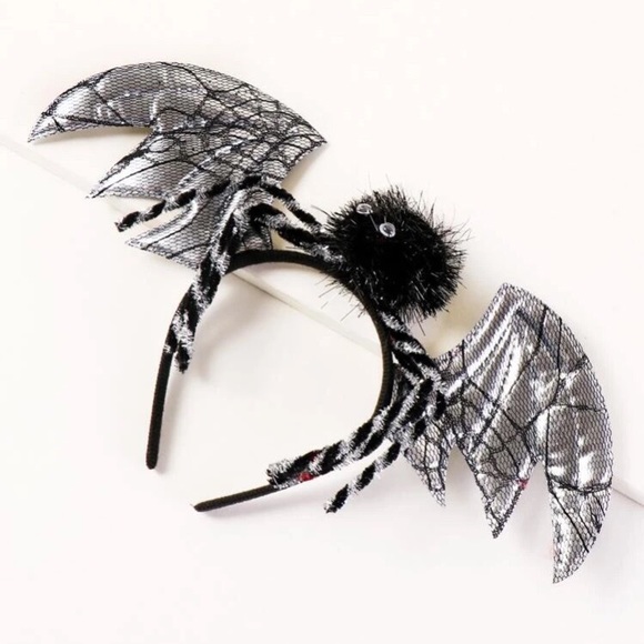 ? Bat wing headdress ?